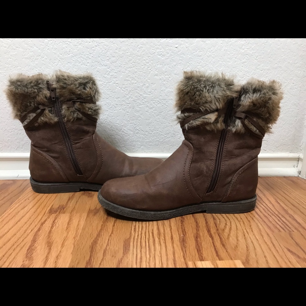 Brown imitation swayed boots. Imitation leather